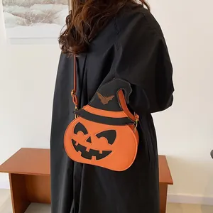 Halloween pumpkin crossbody bag for women with witch hat design and bat pattern details