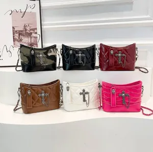 Quilted crossbody bags with gothic cross pendants and skull charms in various colors