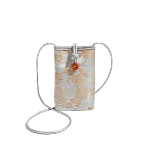 Silver-gray Chinese brocade phone bag with traditional landscape pattern and floral clasp