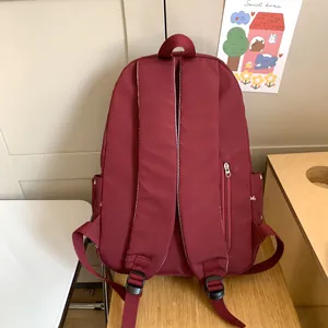 Burgundy quilted backpack for women with bow embroidery and anti-theft back pocket