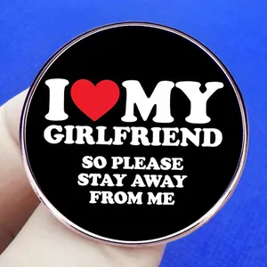 Round metal badge featuring 'I Love My Girlfriend' text and a red heart icon