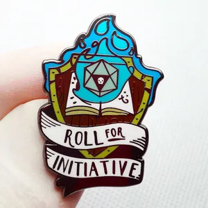 Blue flame shield enamel pin with D20 dice and Roll for Initiative banner text