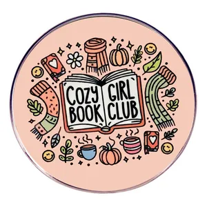 Cozy Girl Book Club enamel pin with autumn themed hand-drawn illustrations on pink base