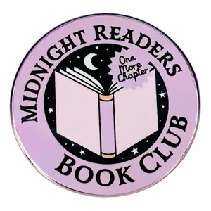 Midnight Readers Book Club enamel pin with moon, stars, and open book design