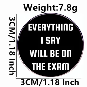 Round teacher badge pin with 'Everything I Say Will Be On The Exam' text, 3cm diameter
