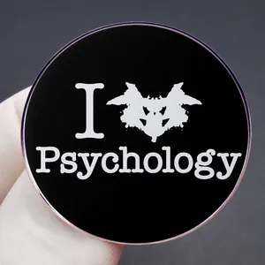 Psychology enthusiast lapel pin featuring Rorschach inkblot test on black enamel