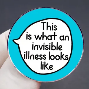 Blue circular pin badge with white speech bubble This is what an invisible illness looks like