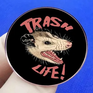 Round Trash Life Opossum enamel pin made of metal alloy for humorous backpack decoration