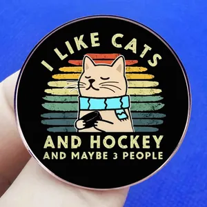 Funny cat and hockey pin badge featuring a cat with scarf and humorous quote