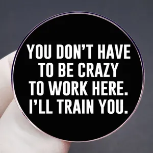 Funny office badge saying You Don't Have To Be Crazy To Work Here I'll Train You