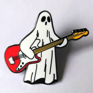 Detailed close-up of a cartoon ghost enamel pin playing a red and white electric guitar