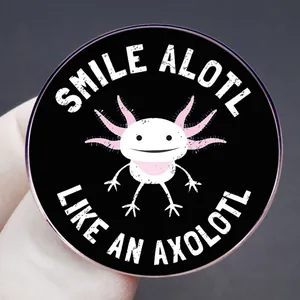 Smiling Axolotl cartoon metal pin badge with Smile Alotl text on black background