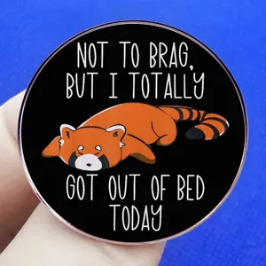 Round enamel red panda pin with text Not to brag but I totally got out of bed today