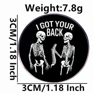 Funny skeleton enamel pin featuring I GOT YOUR BACK text on 3cm black round badge