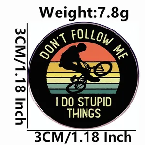 Round BMX brooch pin with rider silhouette and Don't Follow Me I Do Stupid Things text