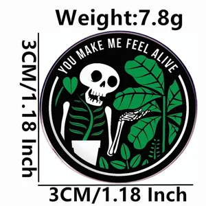 Skull and plant enamel pin with You Make Me Feel Alive text, 3cm round metal badge