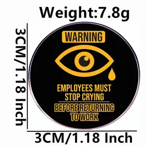 Humorous warning sign brooch featuring employees must stop crying text on black enamel