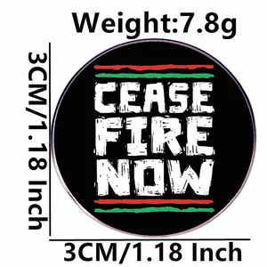 3cm round Cease Fire Now brooch pin in black enamel with red and green accent lines