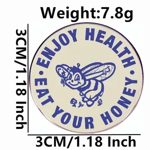 3cm bee enamel pin with Enjoy Health Eat Your Honey slogan and cartoon graphics