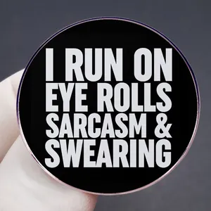 Black round badge with I RUN ON EYE ROLLS SARCASM & SWEARING funny slogan design