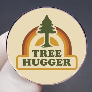 Retro Tree Hugger enamel pin with pine tree and rainbow design on metal badge