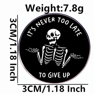 Funny skeleton enamel pin badge with 'It's never too late to give up' text and 3cm size guide