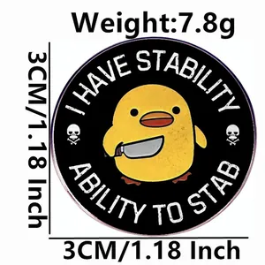 Funny 3cm yellow chick enamel pin with I Have Stability text and knife graphic