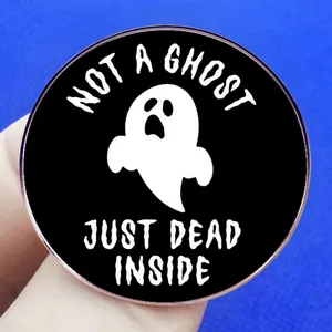 Round Halloween ghost pin badge featuring Not A Ghost Just Dead Inside text design