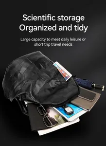 Detail view of large capacity black PU leather backpack showing organized inner storage space