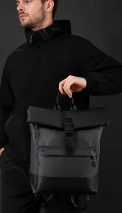 Close-up of waterproof business backpack with secure buckle closure and minimalist matte finish