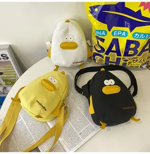 Three colors of cartoon duck canvas crossbody bags featuring adjustable fabric shoulder straps