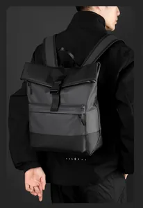 Detail of waterproof business backpack with roll-top closure and adjustable strap