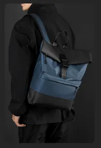 Detail of waterproof business backpack with flap buckle closure and contrast design
