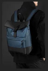 Detail view of a waterproof business backpack with contrast panels and buckle closure