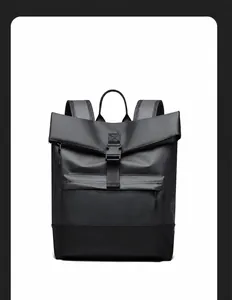 Detail view of the waterproof business backpack showing black plastic buckle and front zipper