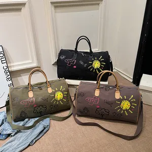 Sacs de voyage graffiti à la mode en noir, vert et marron avec grande capacité en toile