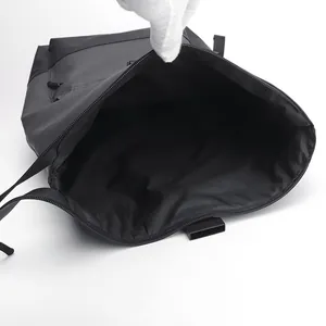 Waterproof business backpack showing spacious interior compartment and durable lining