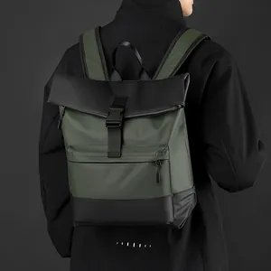 Waterproof business backpack in dark green and black matte fabric with roll-top design