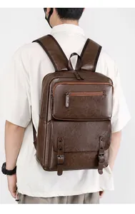 Detail view of large capacity dark brown leather backpack for men in a casual travel style