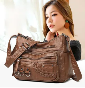 Borsa a tracolla vintage in pelle lavata marrone con tasche con zip e dettagli metallo