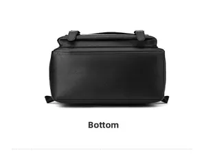 Detailed bottom view of black leather backpack with reinforced stitching and soft texture