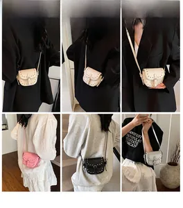 Mini saddle bags with metal rivets shown in white, pink, black and silver colors