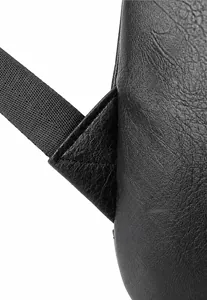 Detail showing triangle reinforced stitching on black leather laptop backpack strap