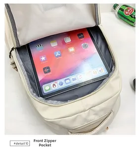 Macro view of spacious main compartment with tablet sleeve and front zipper pocket