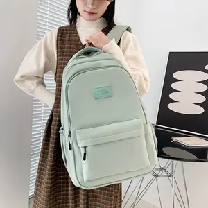 Lightweight mint green large capacity backpack for students with waterproof nylon fabric
