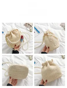 Detailed views of a straw bucket bag with floral accents and pearl strap from four angles