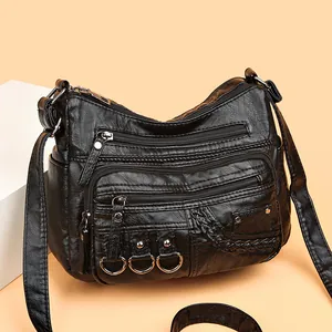 Borsa a tracolla in pelle lavata nera per donne mature con tasche multiple con cerniera