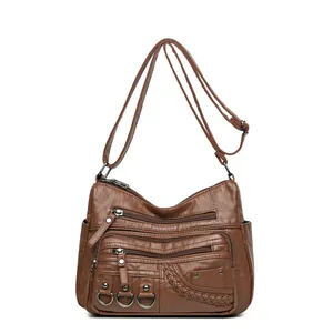 Borsa a tracolla in pelle lavata marrone con tasche multiple e cinturino regolabile