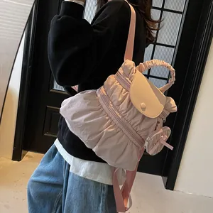 Pink ruffled nylon backpack for women with adjustable straps and cute bow charm