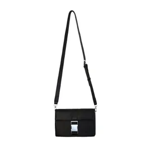 Minimalist black square crossbody bag with matte finish and silver metal buckle